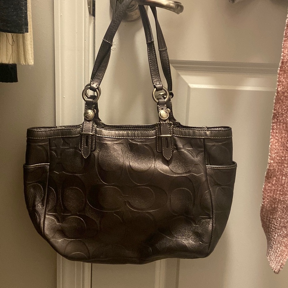 Silver coach was purse like new